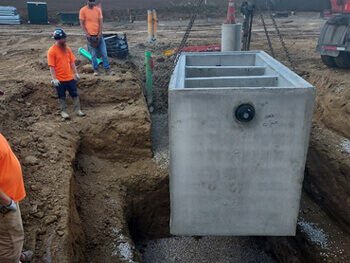 Men installing equipment for a Mechanical Service project