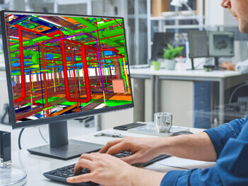 Man working on a computerized fire protection system design